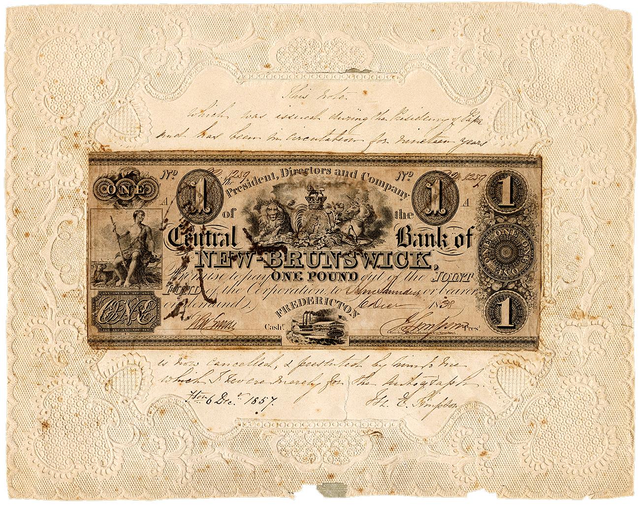 Bank note, geometric designs, allegorical figures, pasted on a doily with handwriting on it.