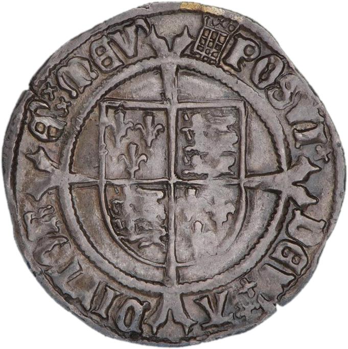 Roughly struck silver coin with a cross over a shield.