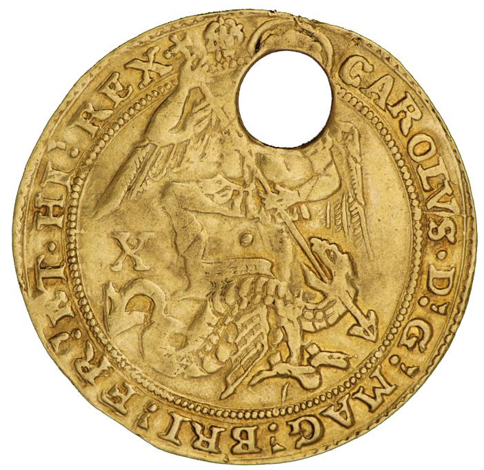 A pierced, gold coin with a warrior angel killing a dragon.
