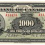 Bank note, pale green, elaborate geometric patterns, a balding man in an old-fashioned high-collared suit: Sir Wilfrid Laurier.