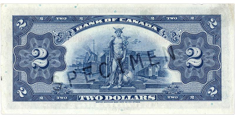 1935_2-dollar_verso_EN Bank note, blue, elaborate geometric patterns, a man in a winged helmet in front of steam ships in a harbour, trains and an airplane.