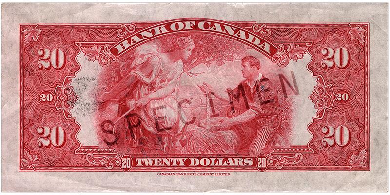 Bank note, pink, elaborate geometric patterns, a robed woman holding a ceremonial rod, a young man with harvested grain.