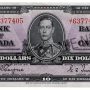 Bank note, purple, elaborate geometric patterns, a young man in an old-fashioned military uniform: King George VI.