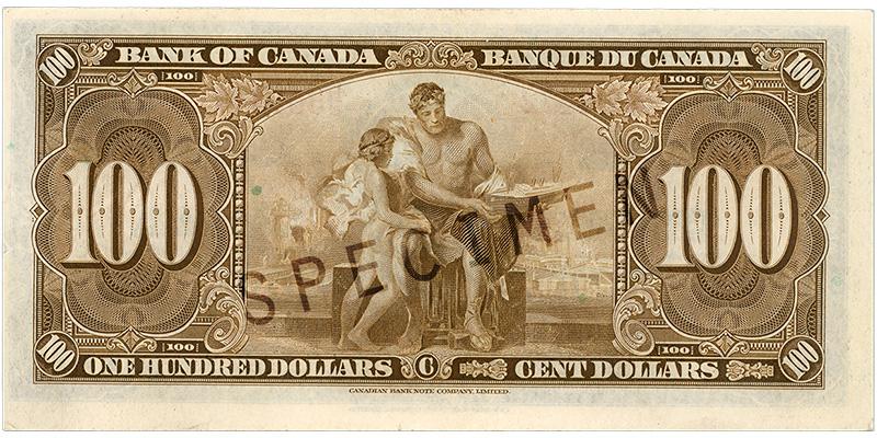 1937_100-dollar_verso Bank note, brown, elaborate geometric patterns, a man in robes showing a boy a model cargo ship in front of a scene of industry and smoke.