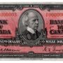 Bank note, pink, elaborate geometric patterns, a balding man in an old-fashioned high-collared suit: Sir Wilfrid Laurier.