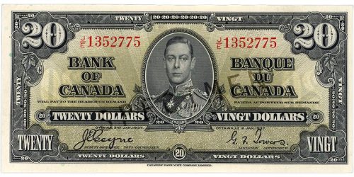 Bank note, pale green, cropped, elaborate geometric patterns, a young man in an old-fashioned military uniform: King George VI.
