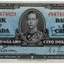 Bank note, blue, elaborate geometric patterns, a young man in an old-fashioned military uniform: King George VI.
