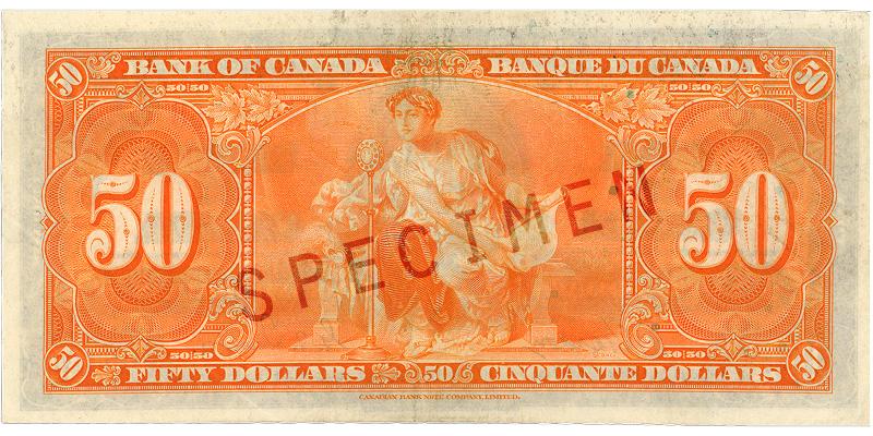 Bank note, orange, elaborate geometric patterns, a person in a robe holding a rolled document and speaking into a microphone.
