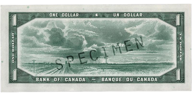 Bank note, green, a frame of geometric patterns, flat fields with a dusty road heading up toward a tall, boxy building on the horizon, a wheat elevator.