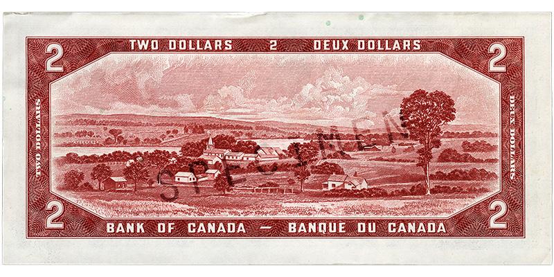 Bank note, red-brown, a frame of geometric patterns, farms and a village near a river, a tall tree to one side.