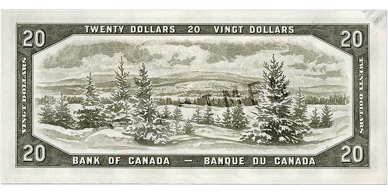 Bank note, olive green, a frame of geometric patterns, a snow-covered valley of evergreen trees in front of low, distant mountains.
