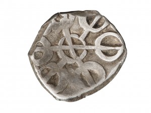 irregularly shaped stamped coin