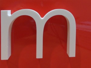 A plastic letter M