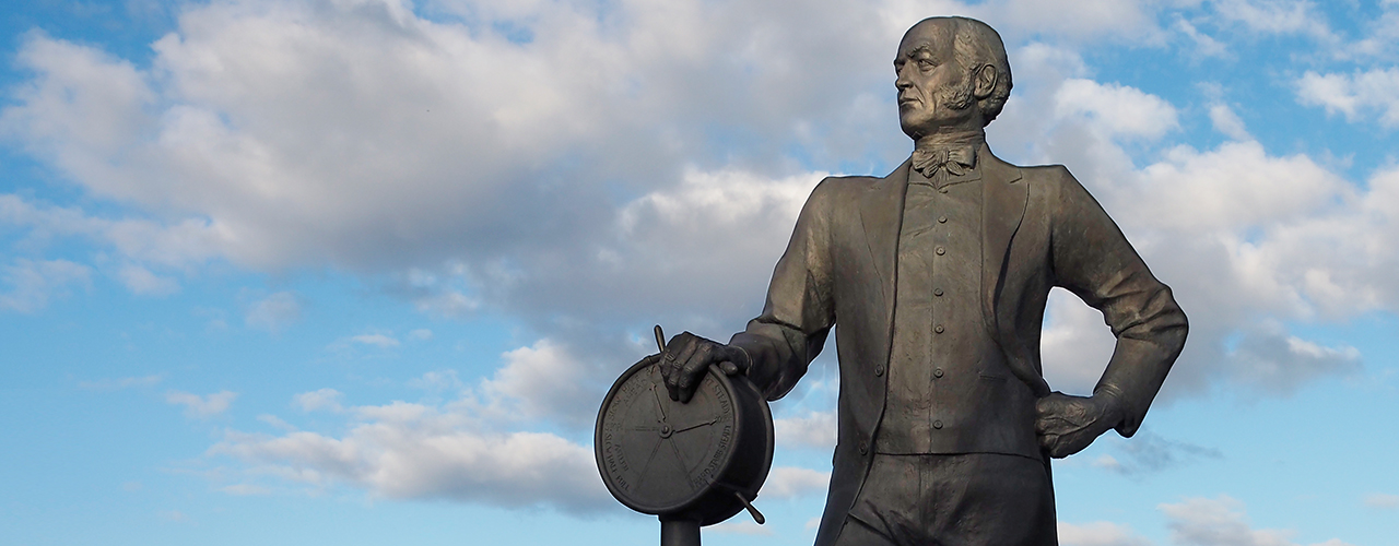 statue of a man with a ship’s telegraph control statue of a man with a ship’s telegraph control