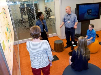 students in a lounge-like meeting space