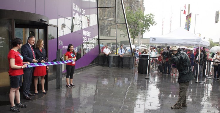 ribbon cutting ceremony in the rain