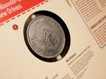 large, plastic coin reproduction