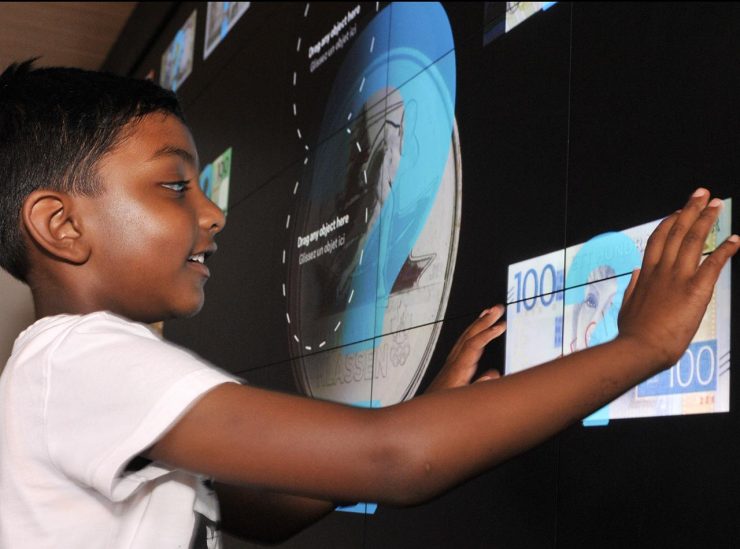 visitor operating digital touch wall visitor operating digital touch wall