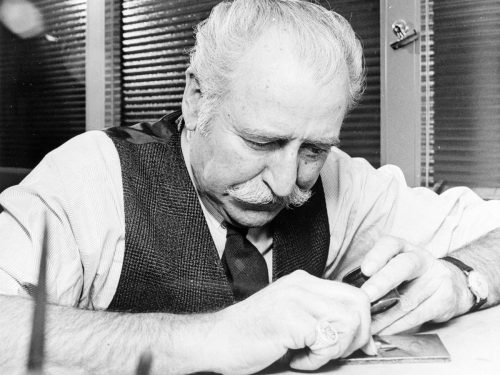 black and white image of bank note engraver George Gundersen at work