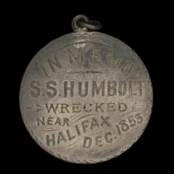 Hand engraved token with shipwreck details