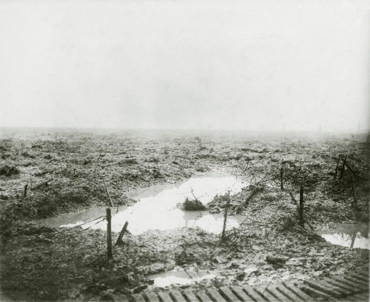 black and white picture of battlefield of mud and water