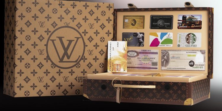 Paper briefcase with imitation money, credit cards and cheques