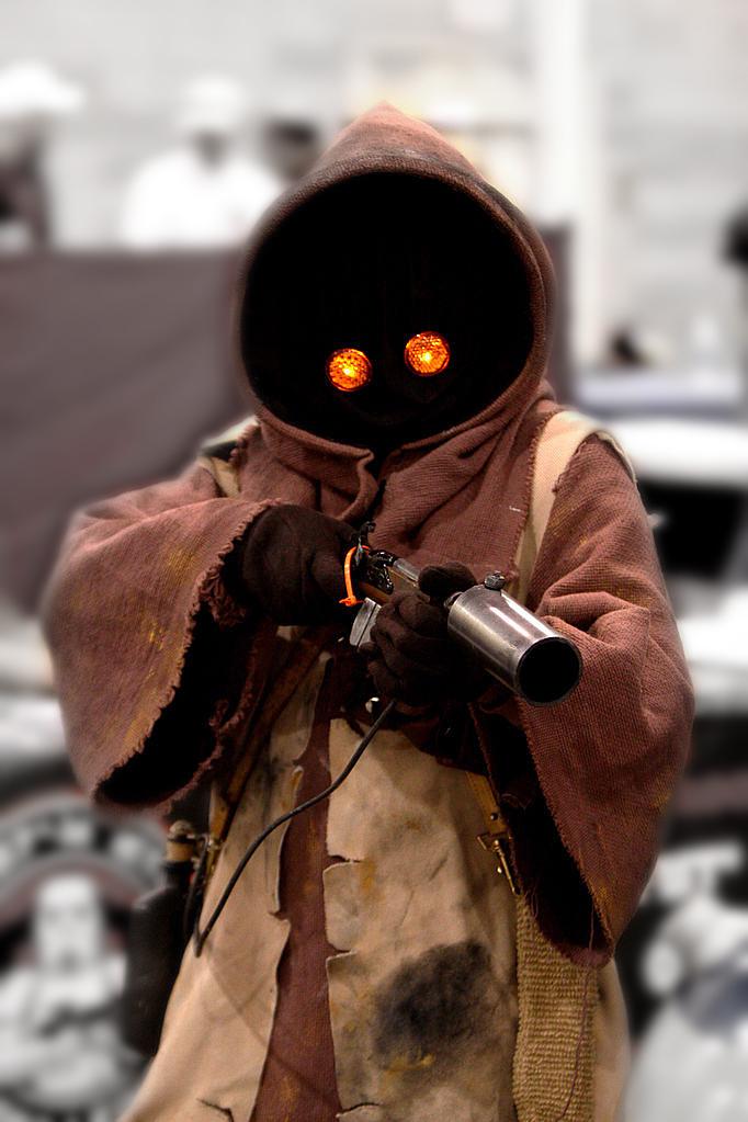 a person in a homemade Star Wars “Jawa” costume a person in a homemade <i>Star Wars</i> “Jawa” costume