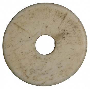 Disc, dull yellowish white, with hole in centre.