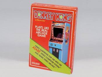A video game cartridge displaying an arcade game.