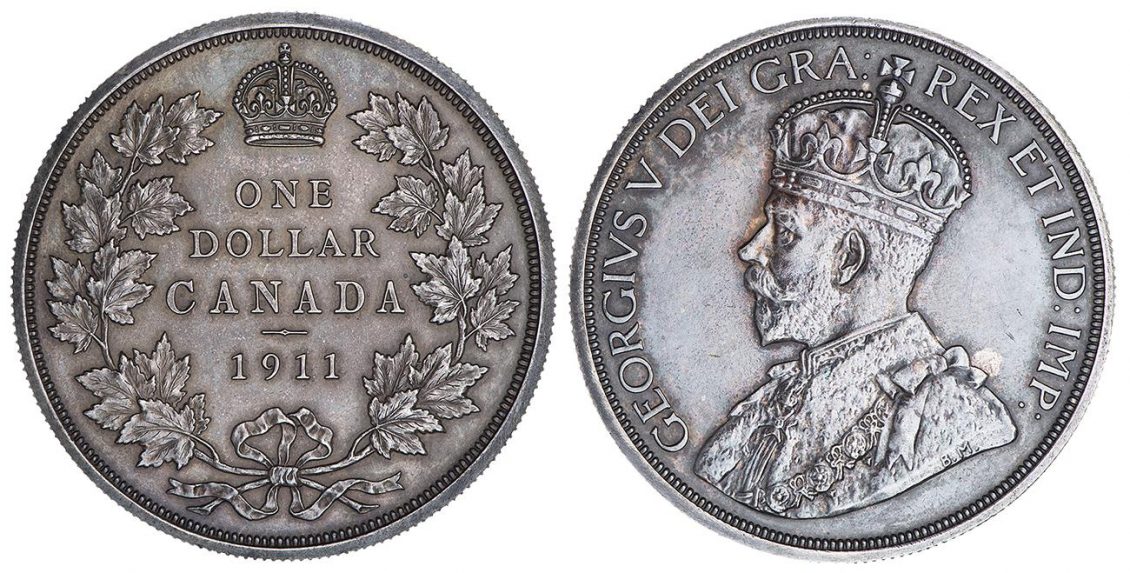 Coin, silver, on the front side a portrait of a crowned king, the back side a wreath of maple leaves.