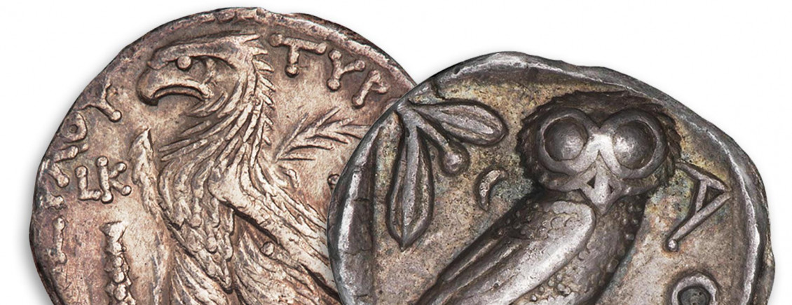 Coins, 2, roughly made, 1 with a standing eagle, 1 with a large-eyed owl.