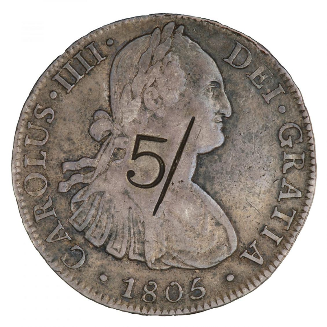 Spanish coin Coin, old, silver, profile of man with laurel leaves in hair and a number 5 stamped over top.