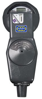 A parking meter. A metal box with a coin slot and a round top with an LCD digital display.