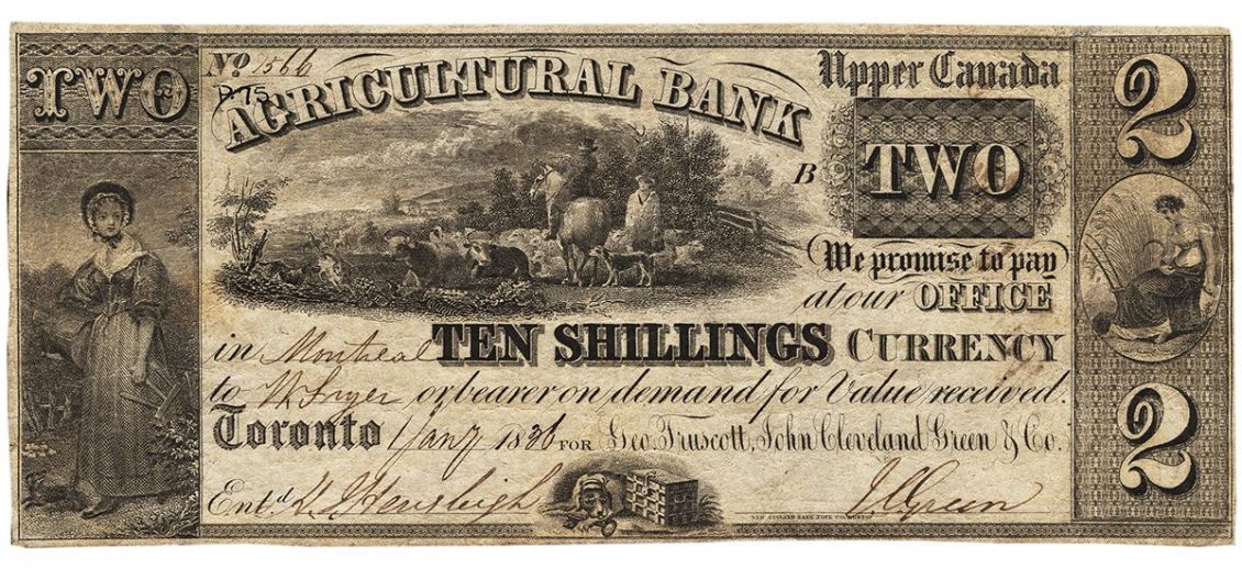Bank note, yellowed paper, black ink, elaborately patterned decoration and scripted printing.