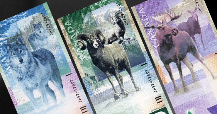 Bank notes, 3, one with a wolf, one a mountain sheep, one a moose.