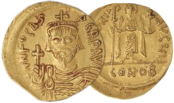 Coin, gold, roughly round, crude portrait of a bearded man wearing armour and a crown and holding a cross.