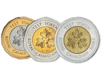 Three coins, a gold-coloured circular rim with a silver-coloured core, a silver-coloured seven-sided rim with a gold-coloured core, and a silver-coloured rim with a bronze core, all with three maple leaves in the centre and an inscription around on both sides.