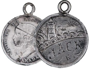 Coin with an attached loop, original surface removed, and the sea, a lighthouse and the name Jack engraved upon it.