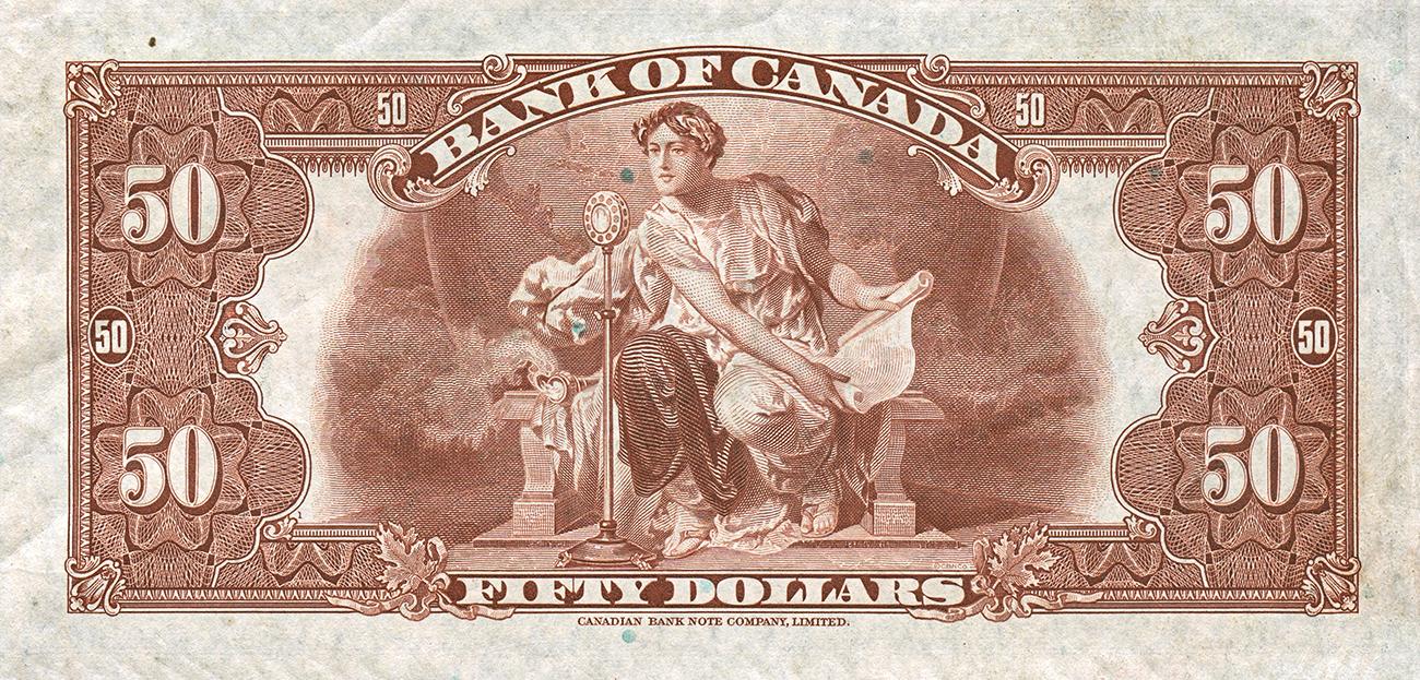 Bank note, brown, ornate engraved border, seated female figure speaking into a microphone.