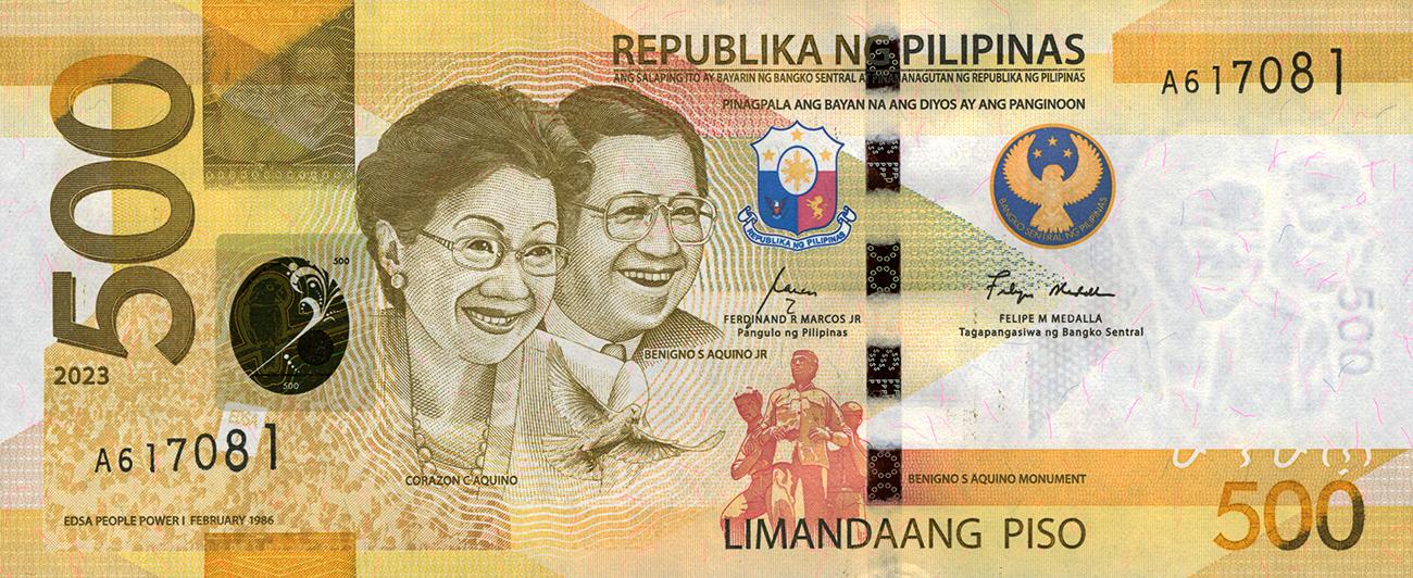 Bank note, yellow, side-by-side portrait of a smiling woman and man, both wearing formal attire and glasses.